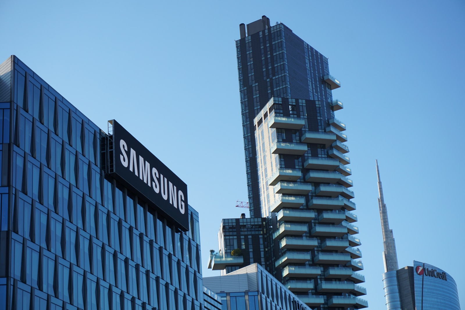 Samsung's new investment black and white city building during daytime