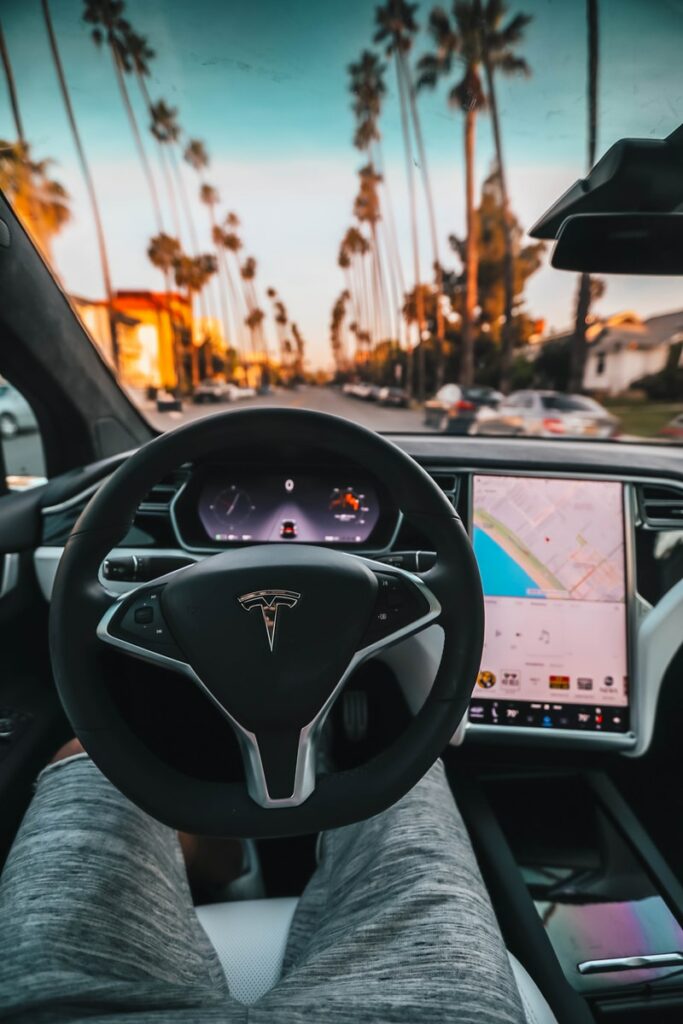 interior view of Tesla car, autonomous driving