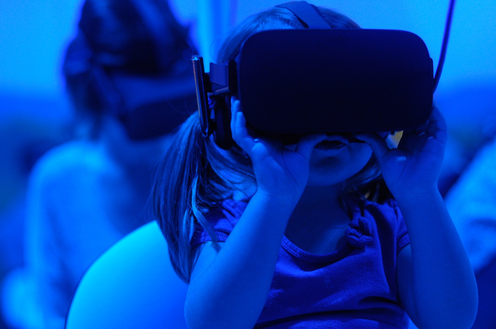 girl using VR goggles Telecom’s Roles in Metaverse