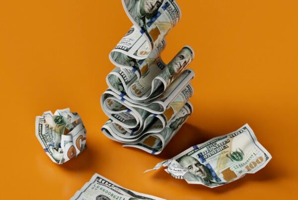 a stack of money sitting on top of a table